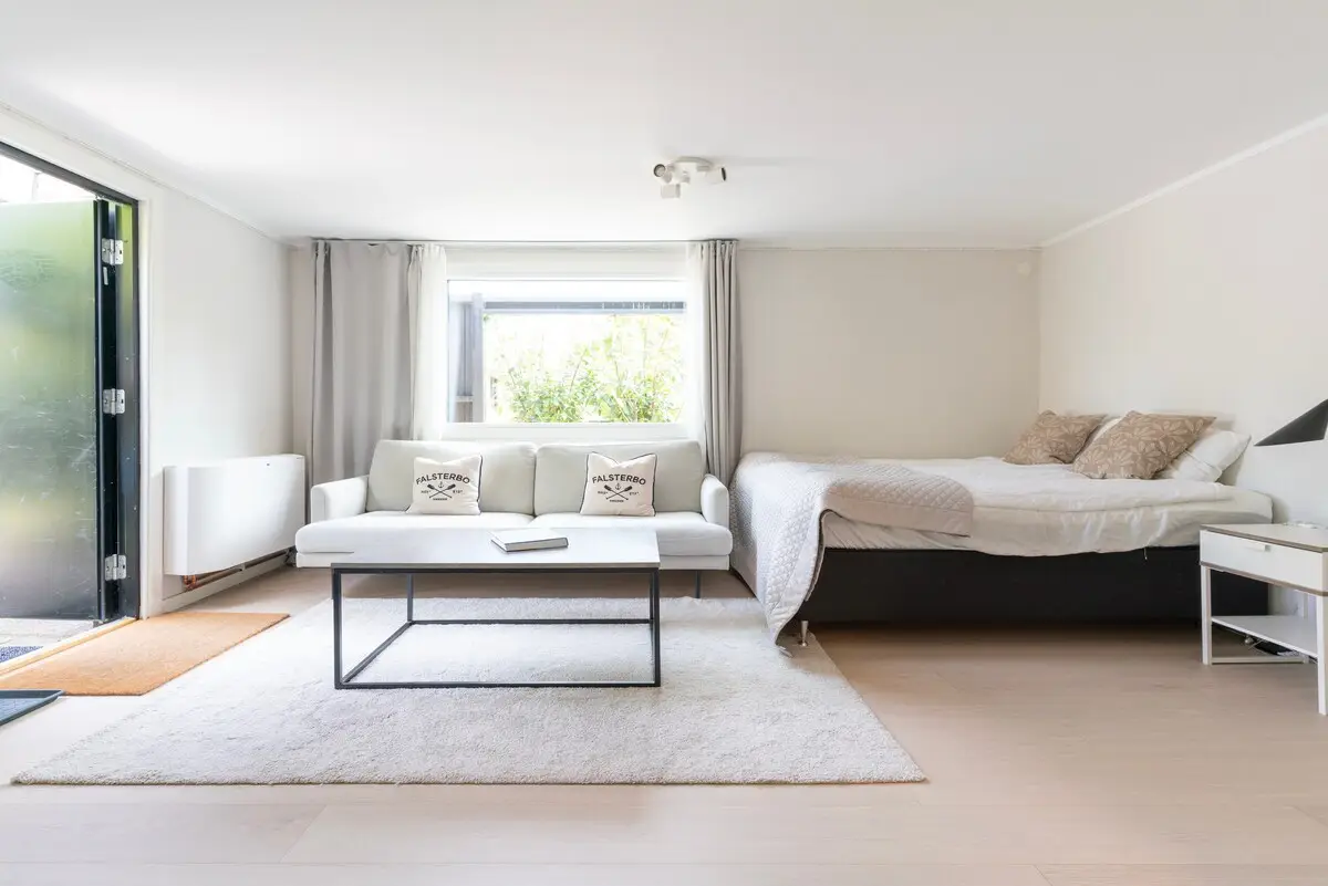 Bedroom with bedside table and lamp